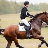 Cross country horse rider wearing 4DflexiSPORT Rider Gilet under body protector